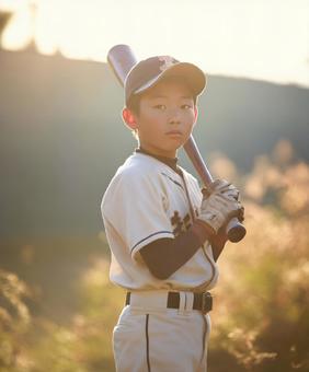 少年と野球の写真