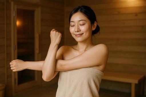 サウナ後にストレッチする人 サウナ後にストレッチする人の写真