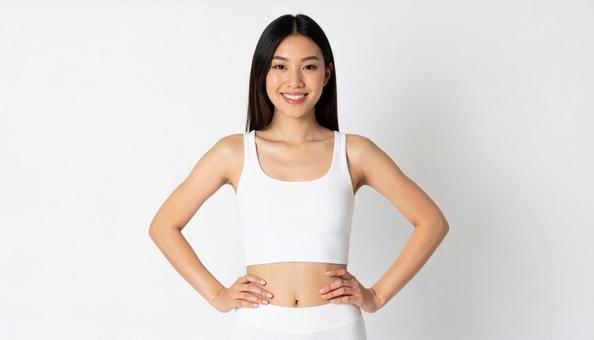 笑顔女性のフィットネスウェアポートレートの写真