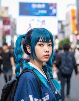 電気街で振り向く、憂鬱な青のコスプレ彼女 電気街で振り向く、憂鬱な青のコスプレ彼女の写真