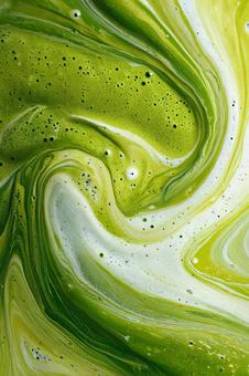 緑と白が混ざる抽象的な絵画の写真