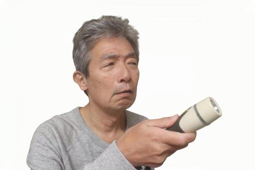 シニア　男性　懐中電灯 シニア,シニア男性,サラリーマンの写真素材