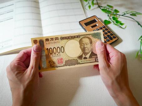 一万円札を数える.3 一万円札を数える.3の写真