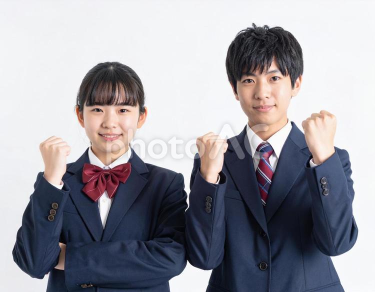 ガッツポーズする男子生徒と女子生徒 高校生,中学生,ガッツポーズの写真素材