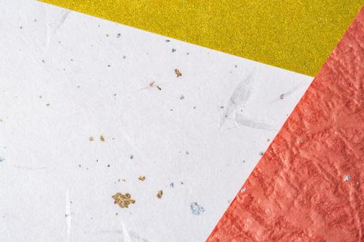 金銀の箔が散る和紙と色紙の抽象背景 和紙,紙,色紙の写真素材