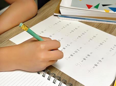 Child doing homework, JPG