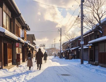 雪の街角を歩く日本人のスナップ風素材の写真