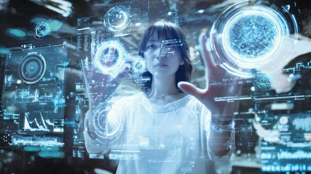 ホログラム操作する女性の写真