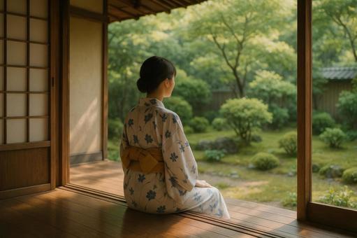 縁側で涼む女性 縁側で涼む女性の写真
