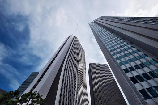 超高層ビルと飛行機 超高層ビルと飛行機 東京都新宿区,超高層ビル,飛行機の写真素材