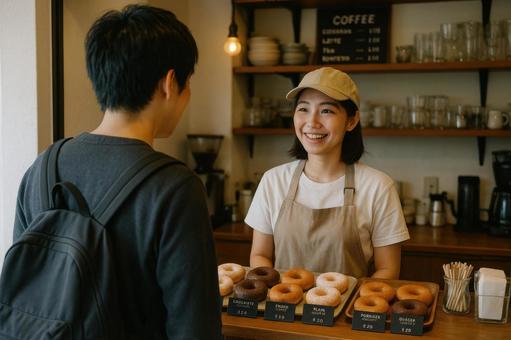 お店のカウンターでドーナツを注文 お店のカウンターでドーナツを注文の写真