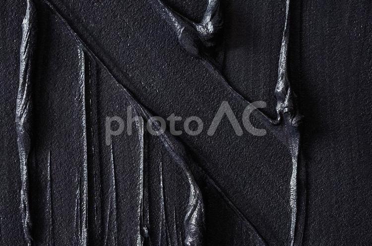 黒のクレイテクスチャーの背景 黒,背景,横の写真素材