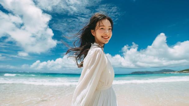 夏の青空と海と白い服の女性の写真