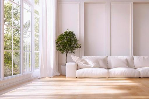 光と緑が満ちる心地よいリビングの写真