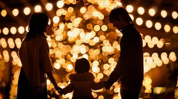 イルミネーション　家族　手を繋ぐの写真