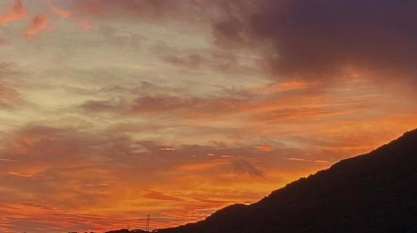Orange-tinted sunset sky, JPG
