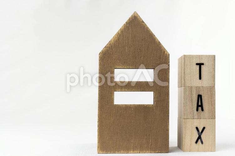 木のブロックのTAXと、玩具の家 家,木,住宅の写真素材