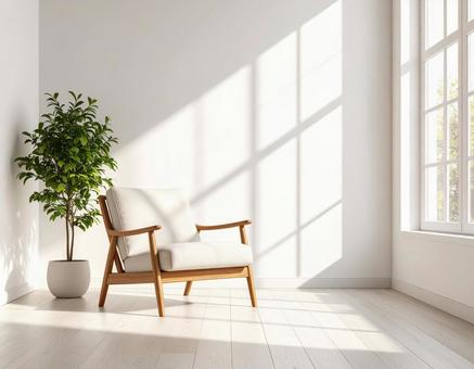 明るい窓辺のソファと観葉植物 明るい窓辺のソファと観葉植物の写真