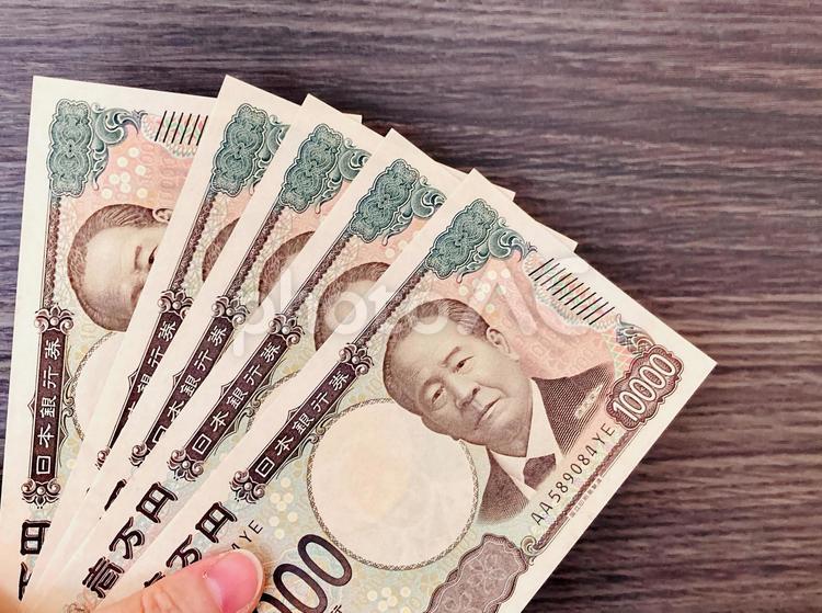 5万円札の儲け 5万円,手元,お金の写真素材