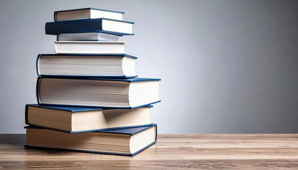 山積みの本のイメージ　積読の写真