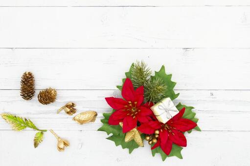 ポインセチアと松ぼっくり、白い木目背景 ポインセチア,クリスマス,松ぼっくりの写真素材