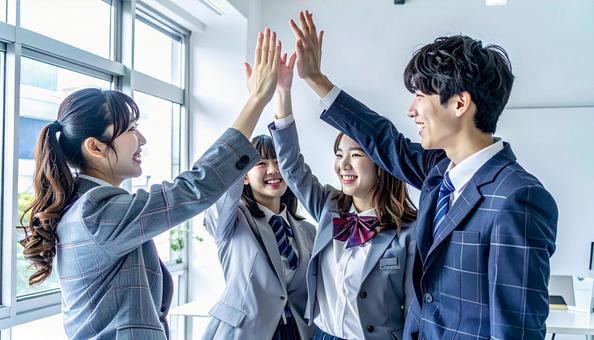喜びを分かち合う学生 喜びを分かち合う学生の写真