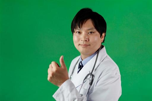 医師の親指を立てる仕草 医師の親指を立てる仕草 医師,白衣,聴診器の写真素材