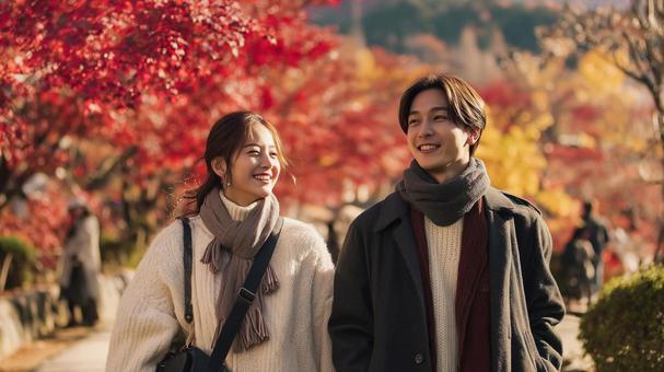 紅葉デートを楽しむカップル 紅葉デートを楽しむカップルの写真