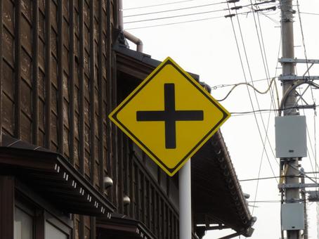 Photo, there is an intersection, road sign, wire, 