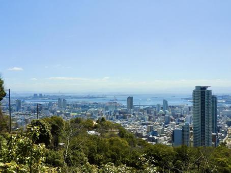 六甲山地から見下ろす港町神戸の都市風景 六甲山地から見下ろす港町神戸の都市風景 神戸市,神戸港,港町の写真素材