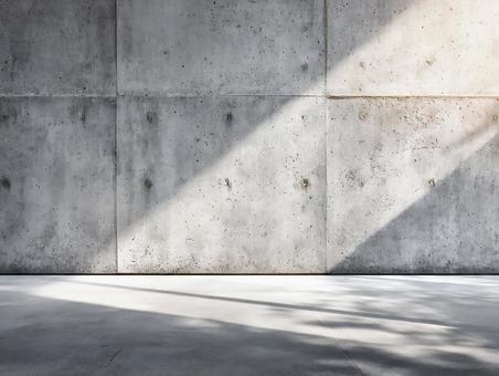 自然光が差し込むコンクリート背景の写真