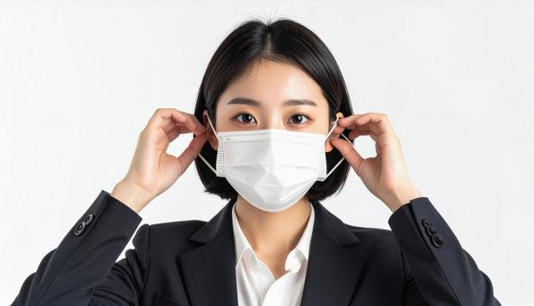 マスクをつける人 マスクをつける人の写真