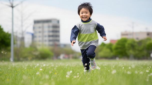 春の野原と日本人の男の子 春の野原と日本人の男の子の写真