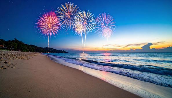 海辺から見る打ち上げ花火 海辺から見る打ち上げ花火の写真
