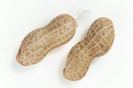 Shelled peanuts on a white background, JPG