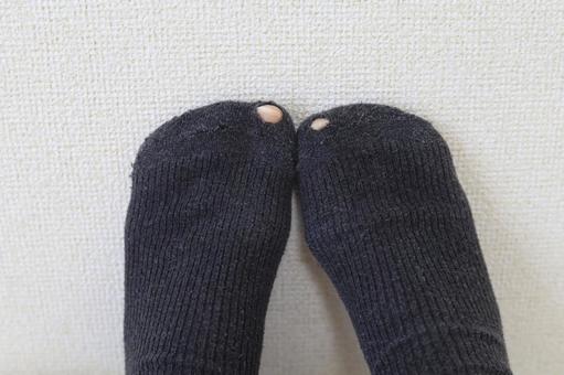 破れた靴下 破れた靴下の写真