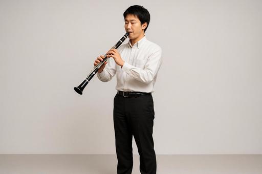 クラリネットを演奏するクラリネッティストの写真