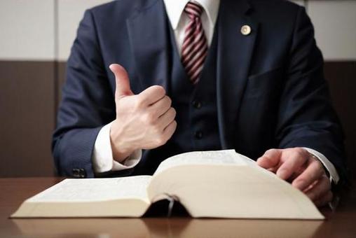 Attorney's hand to give a good sign Attorney's hand to give a good sign