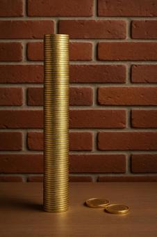 積み上がる富(高くそびえる金貨の塔) 積み上がる富(高くそびえる金貨の塔)の写真