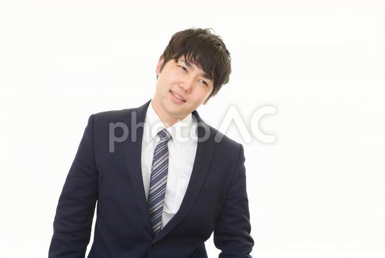 疲れた表情のビジネスマン 男性,ビジネスマン,男の写真素材