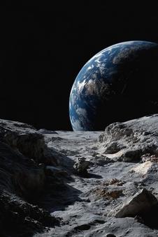 月の荒涼とした風景と生命の星・地球 月の荒涼とした風景と生命の星・地球の写真