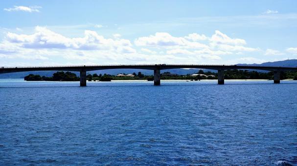 Kouri Bridge and the sky seen from the sea, JPG