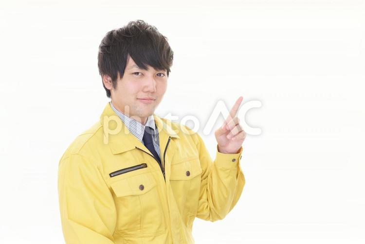 男性　作業員　案内 作業員,作業着,作業服の写真素材