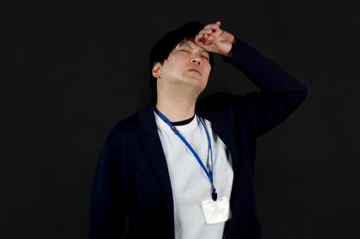 疲れた男性の表情 男性,疲れ,表情の写真素材