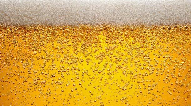 黄金色に輝くビールの泡・炭酸・アルコール 黄金色に輝くビールの泡・炭酸・アルコールの写真