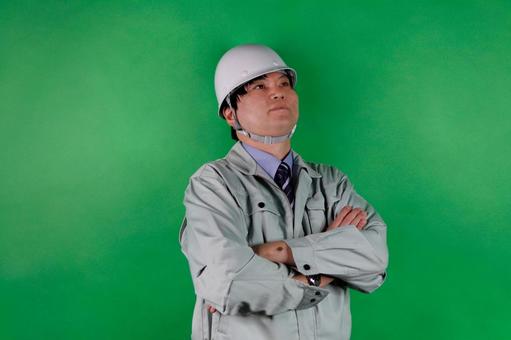 作業服の男性エンジニア 作業服の男性エンジニアの写真