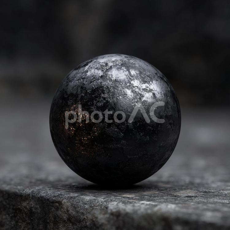 重厚な存在感：金属のような黒いボール 球体,黒,金属の写真素材