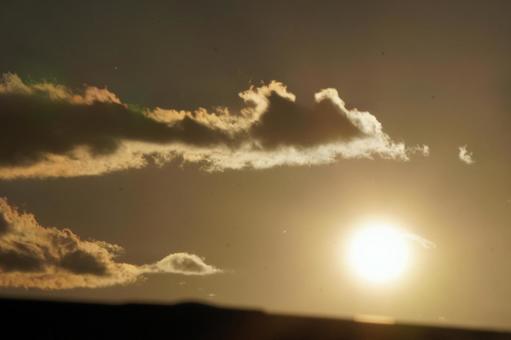 秋の夕日の写真