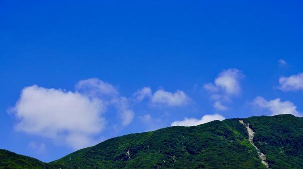 東京都伊豆諸島新島の山(北峰)と空 東京都伊豆諸島新島の山(北峰)と空 新島,北峰,山の写真素材