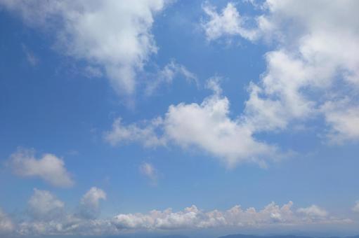 山頂からの青空の写真
